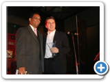 mazher giving tannoy export director an award @ av max awards night function